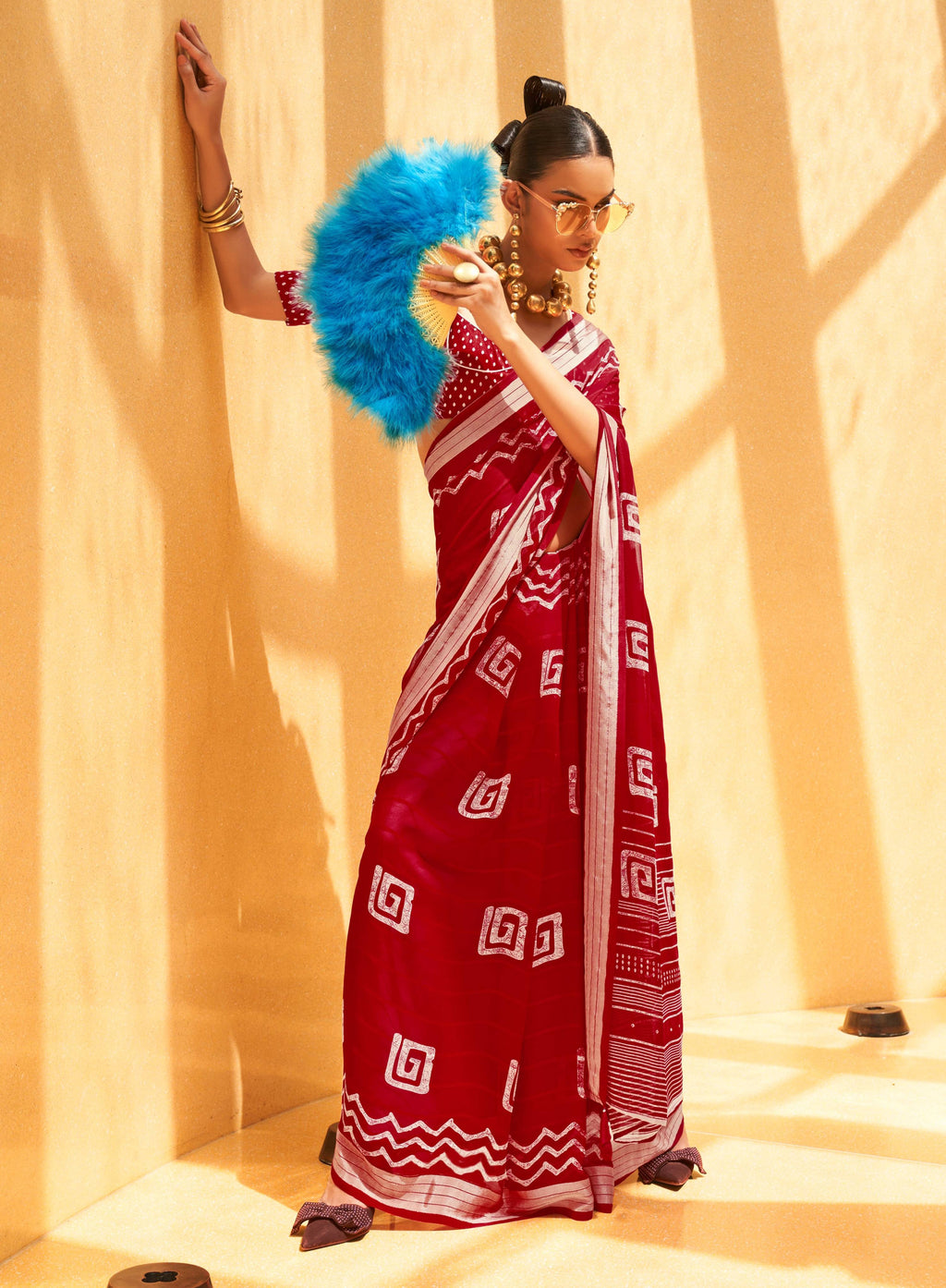 Elegant maroon georgette saree with intricate prints