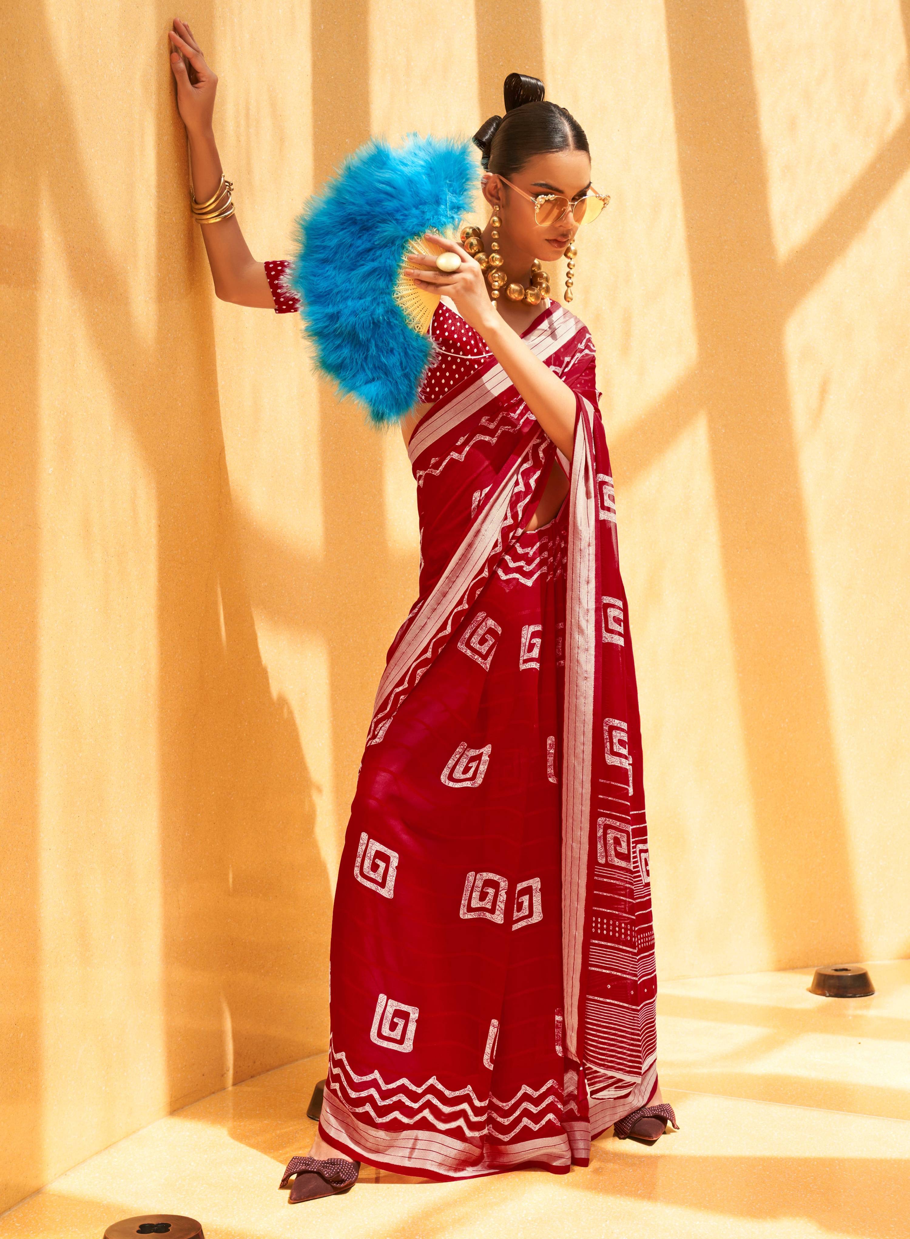 Elegant maroon georgette saree with intricate prints