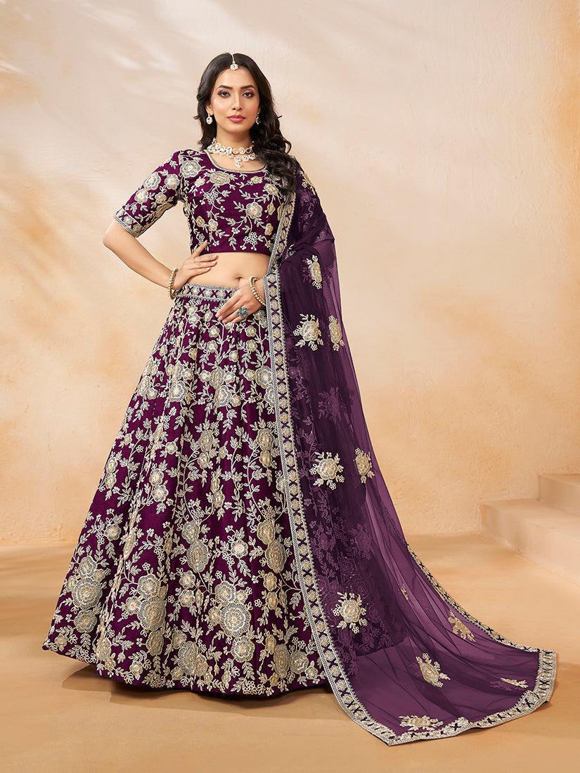 Model wearing a purple embroidered art silk lehenga choli with ornate detailing