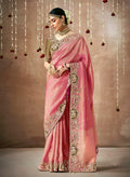 Pink organza silk Bollywood saree with delicate floral embroidery