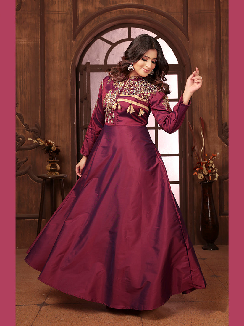 Wine-colored Triva silk wedding gown with heavy ethnic embroidery and intricate handwork.