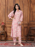 A light pink long kurta and matching pant set with floral printed patterns