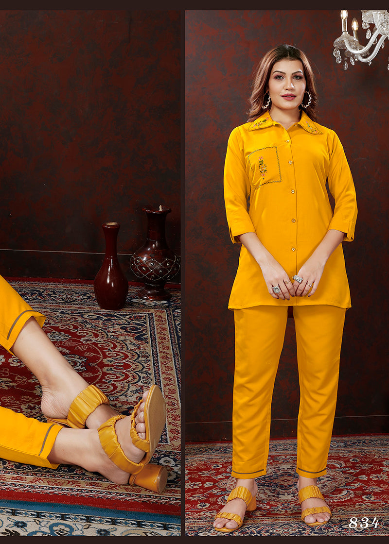 Yellow Maaza cotton co-ord set featuring floral patterns and hand-work