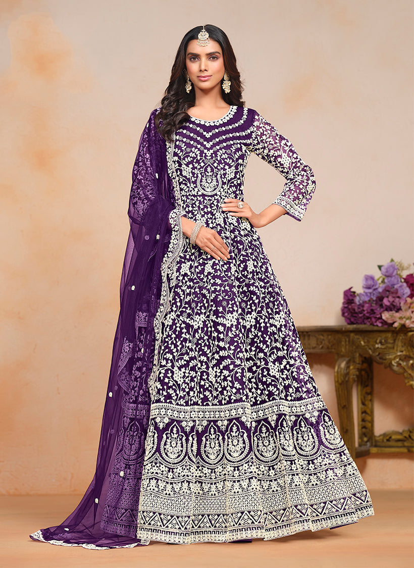 Stunning purple embroidered net salwar suit for special occasions.