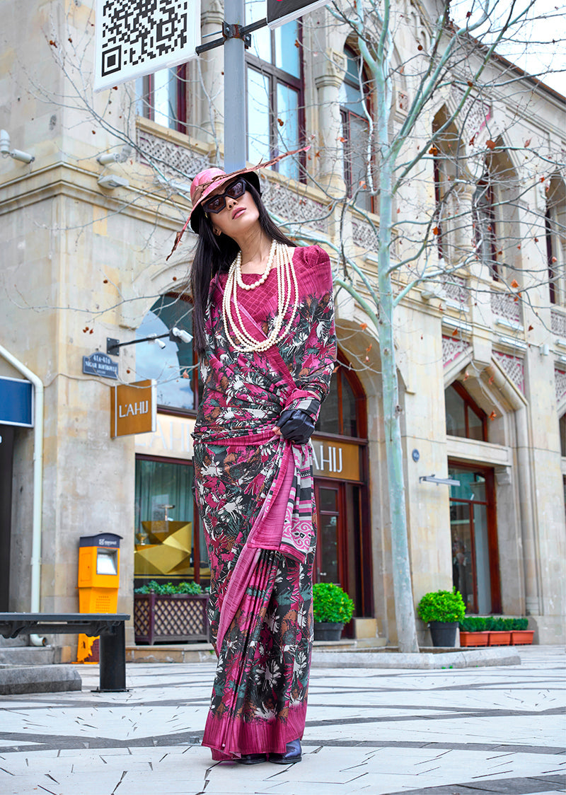 A beautiful multi-colour printed satin saree with a glossy finish and vibrant pattern.