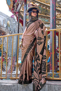 Elegant brown printed satin classic saree with detailed patterns