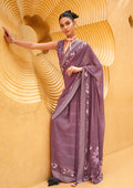 Purple georgette saree with ethnic print design