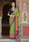 Parrot green and red patola print silk festive saree