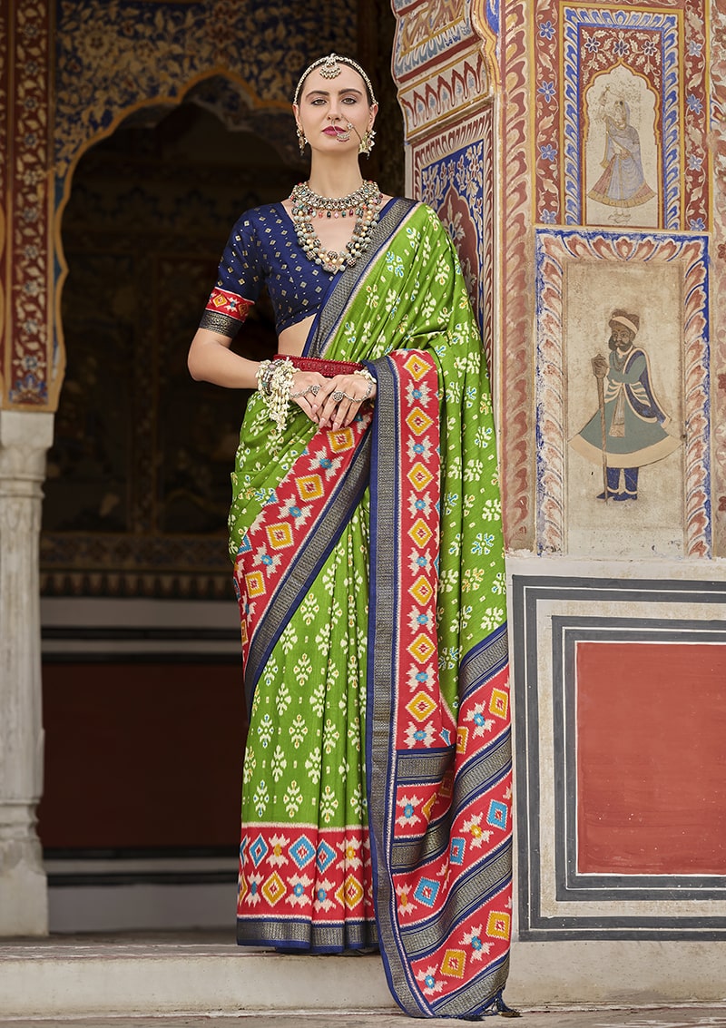 Parrot green and red patola print silk festive saree