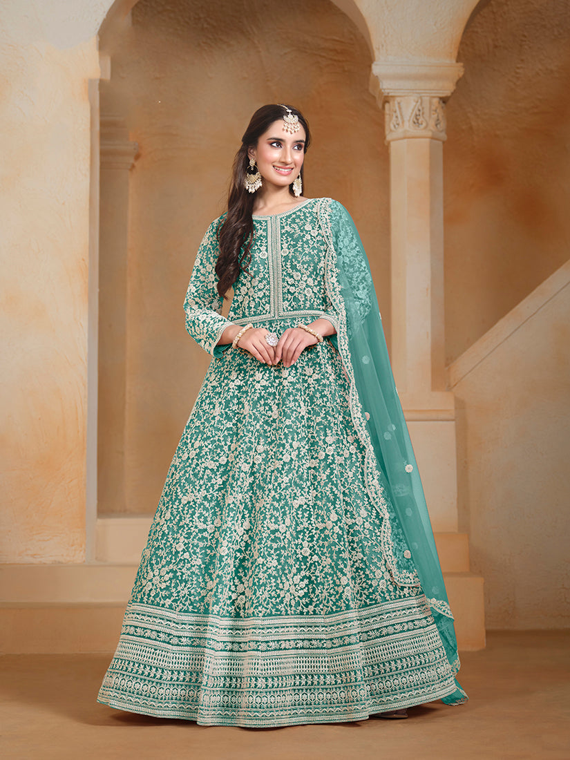 Monjolika Fashion turquoise net salwar suit with intricate embroidery and matching dupatta