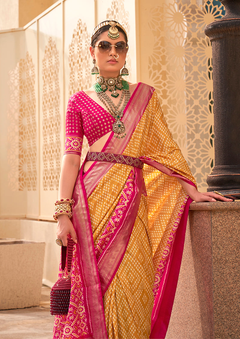 Yellow and Rani Pink Patola Print Classic Silk Saree