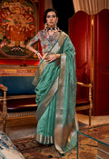 Turquoise chiffon saree with detailed weaving textures