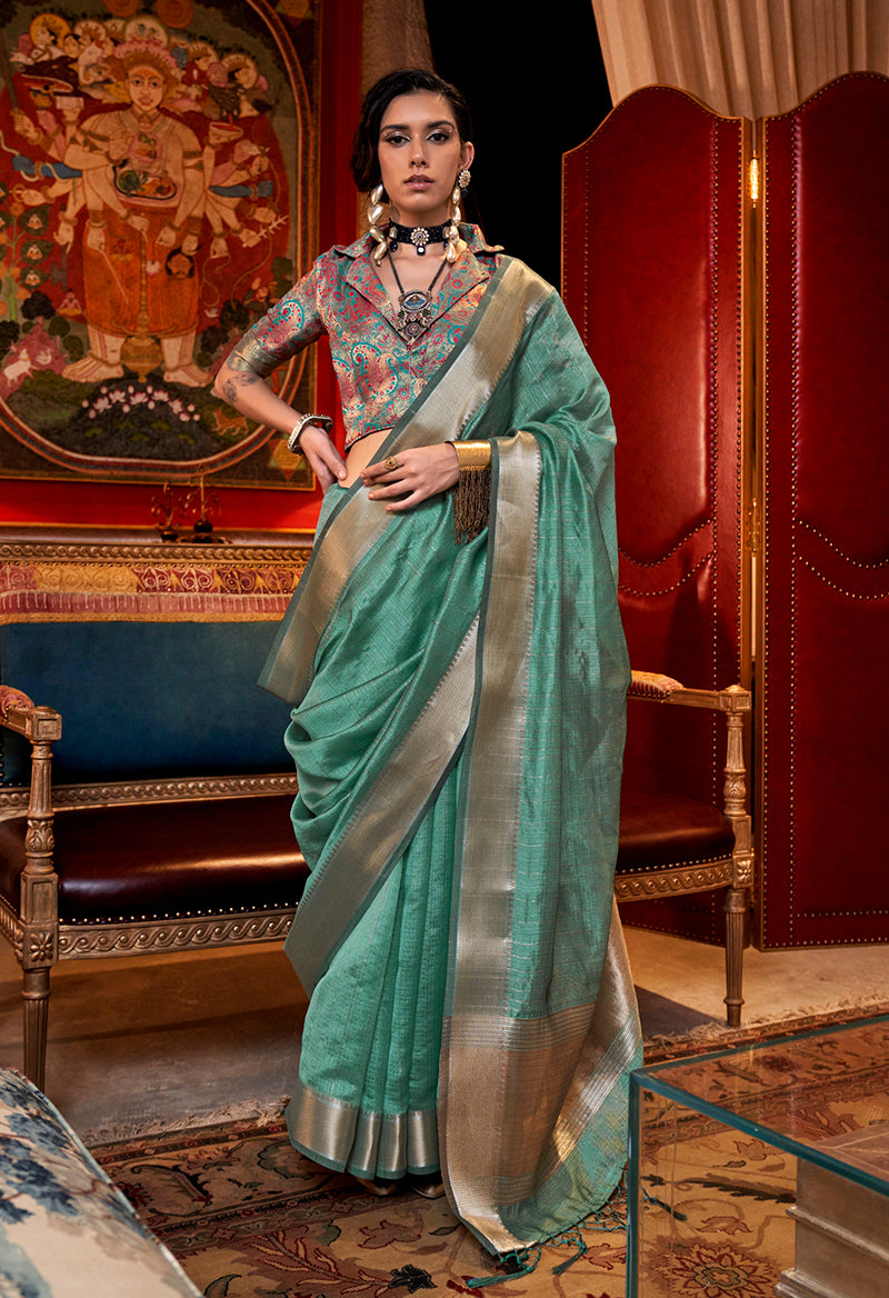 Turquoise chiffon saree with detailed weaving textures