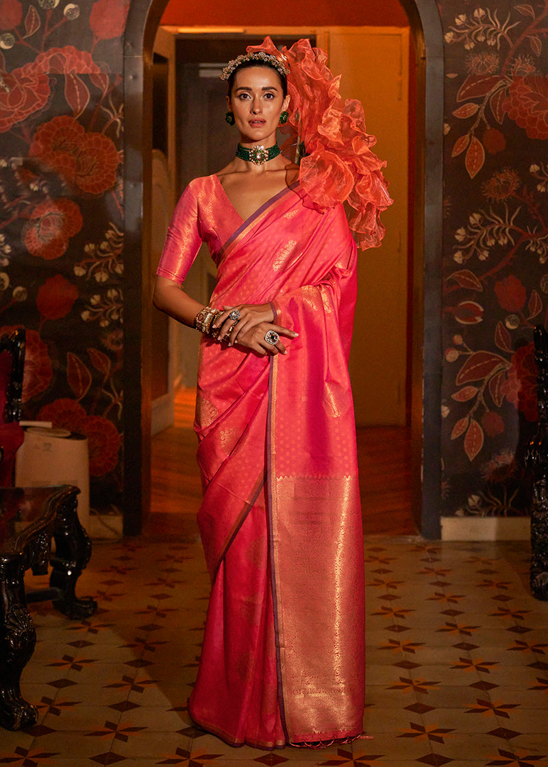 Soft peach handloom silk saree with detailed traditional ethnic weaving