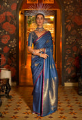 Elegant navy blue handloom silk saree with intricate ethnic weaving