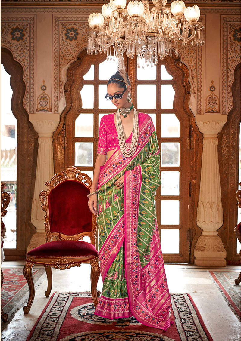 Light green contemporary saree with traditional Patola print design