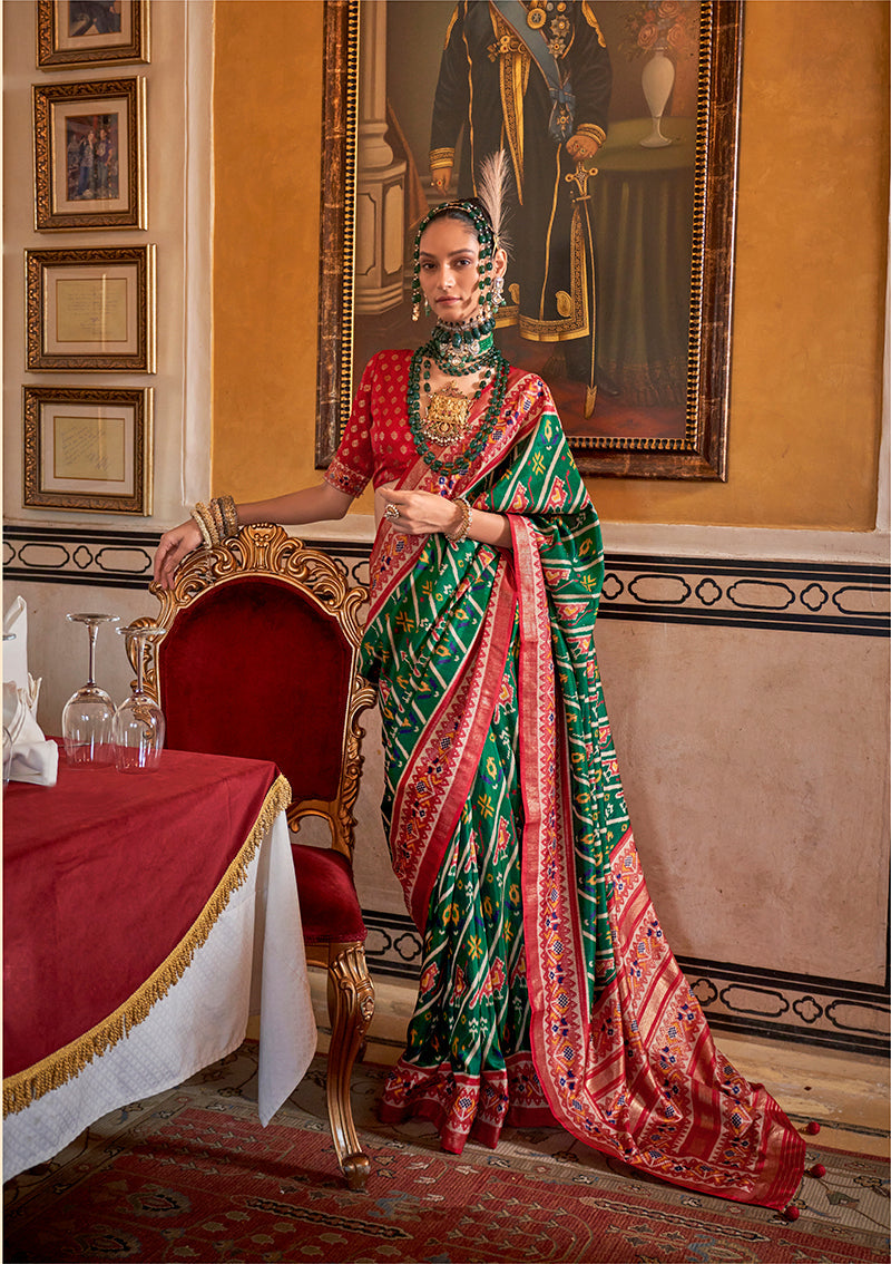 Vibrant green contemporary saree with traditional-inspired Patola print