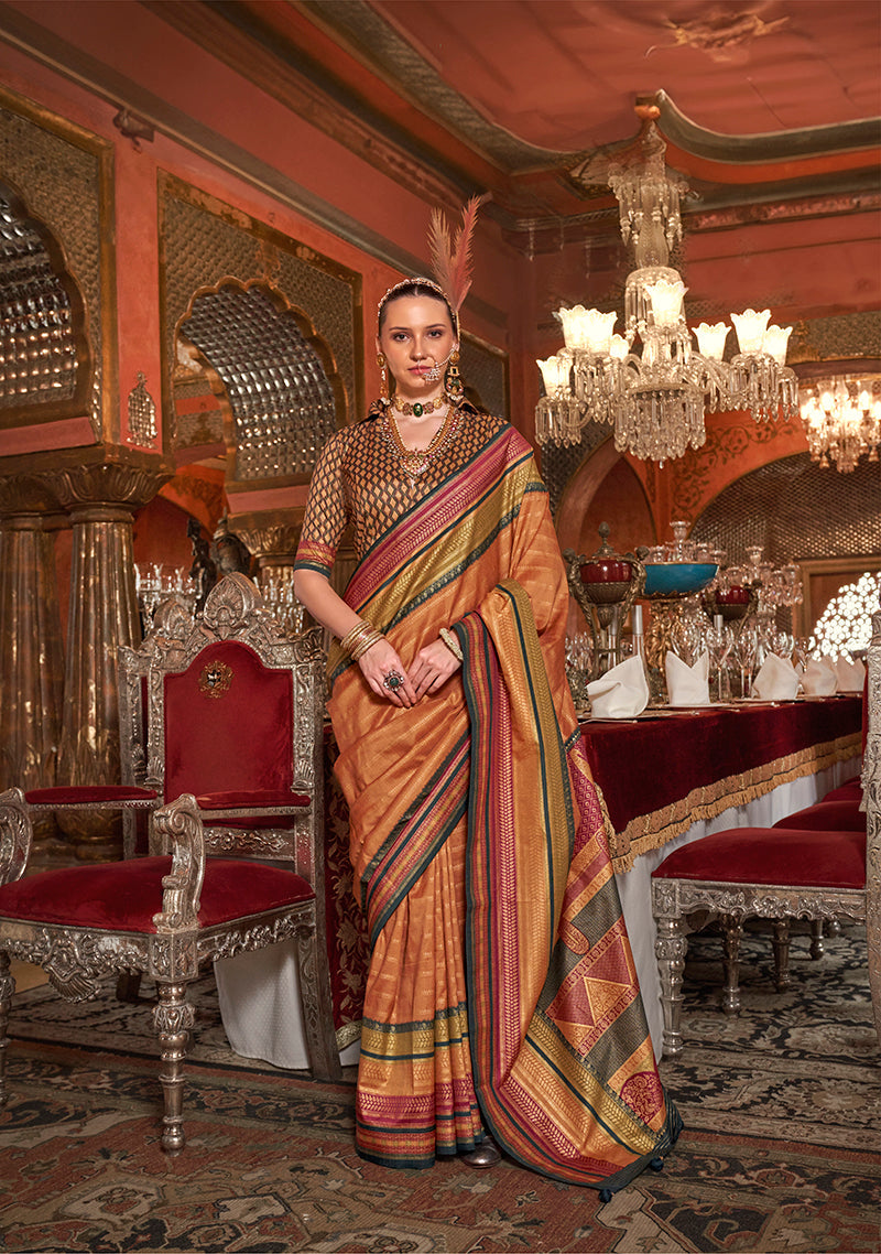 Traditional orange silk saree with gold zari weaving
