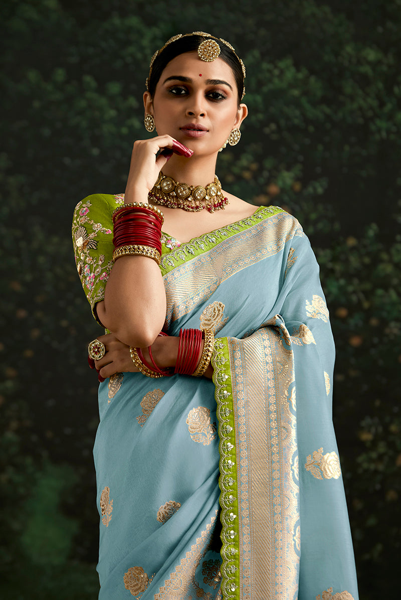 Aqua blue dola silk saree with shimmering sequins border work