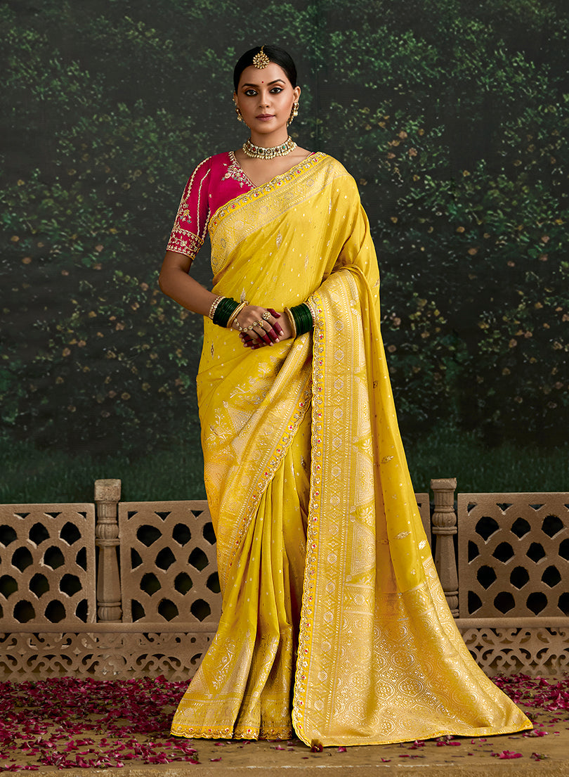 Yellow Dola silk classic saree with decorative sequins embroidered border