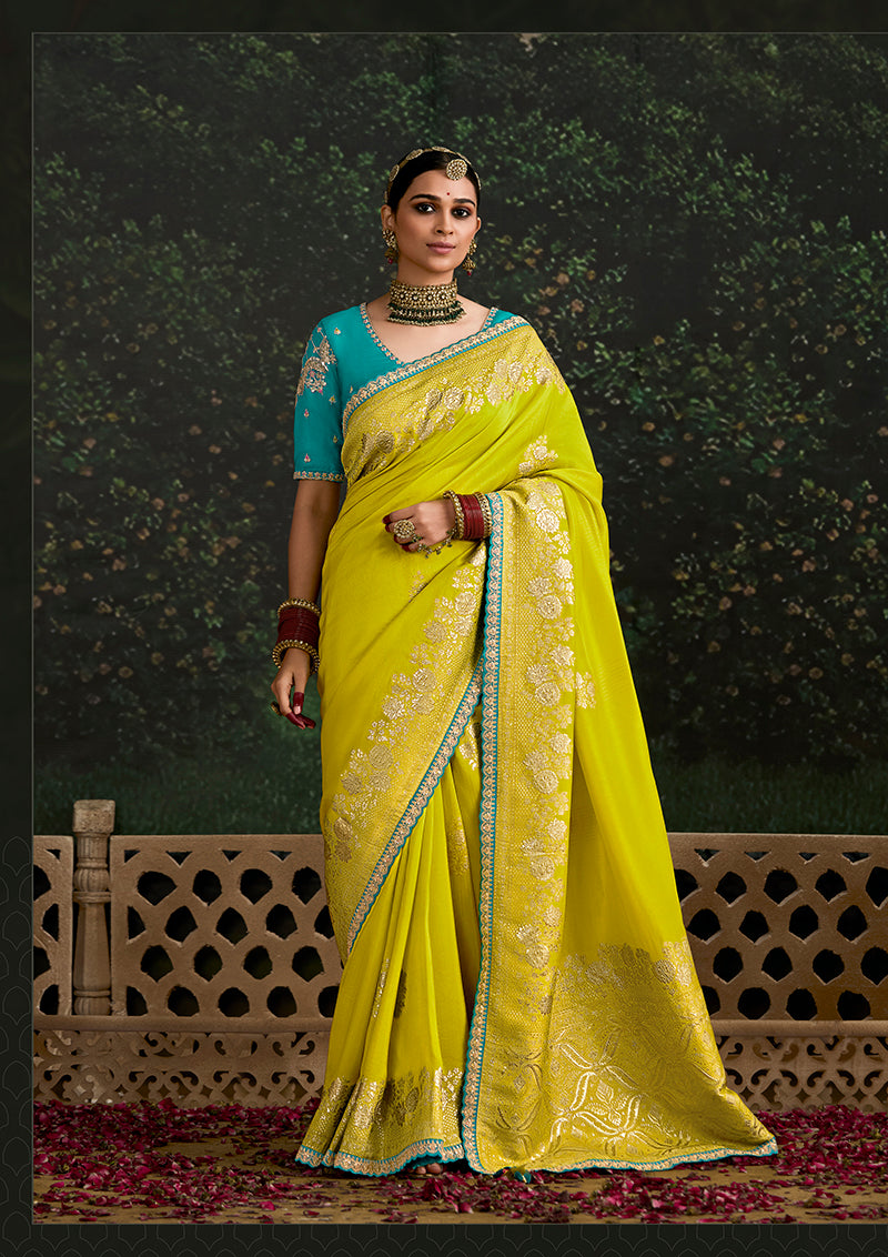 Light olive green Dola silk saree with sequins embroidered border for reception wear