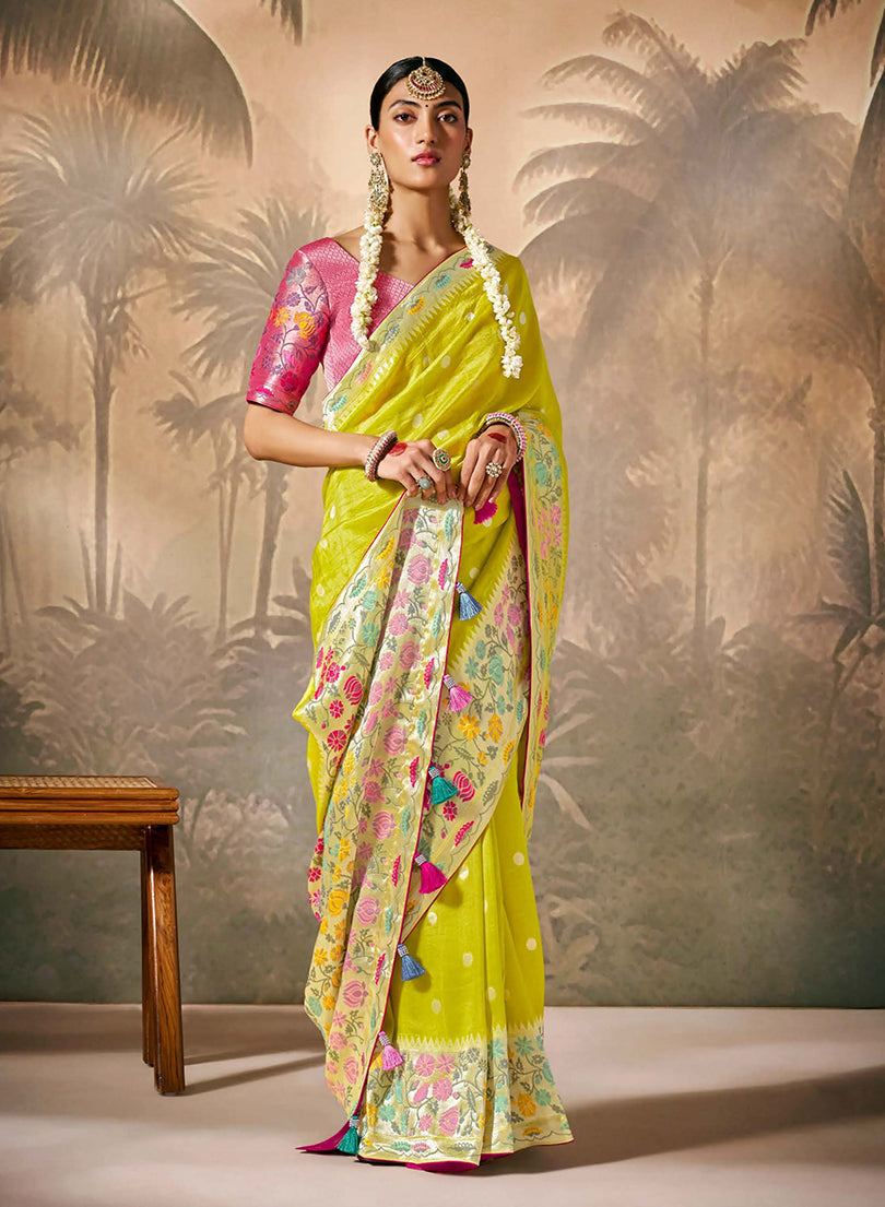 Lime-green and pink silk saree with floral pattern and gold zari work