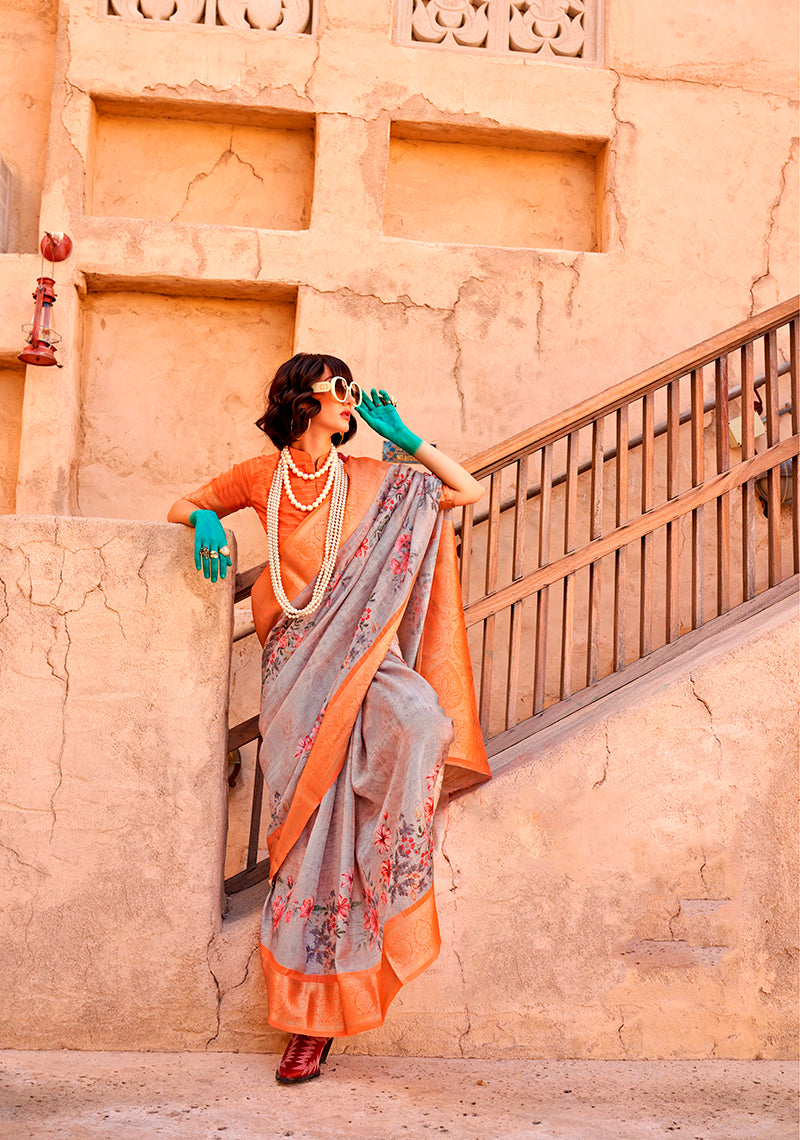 Classic grey georgette saree featuring intricate weaving and digital print