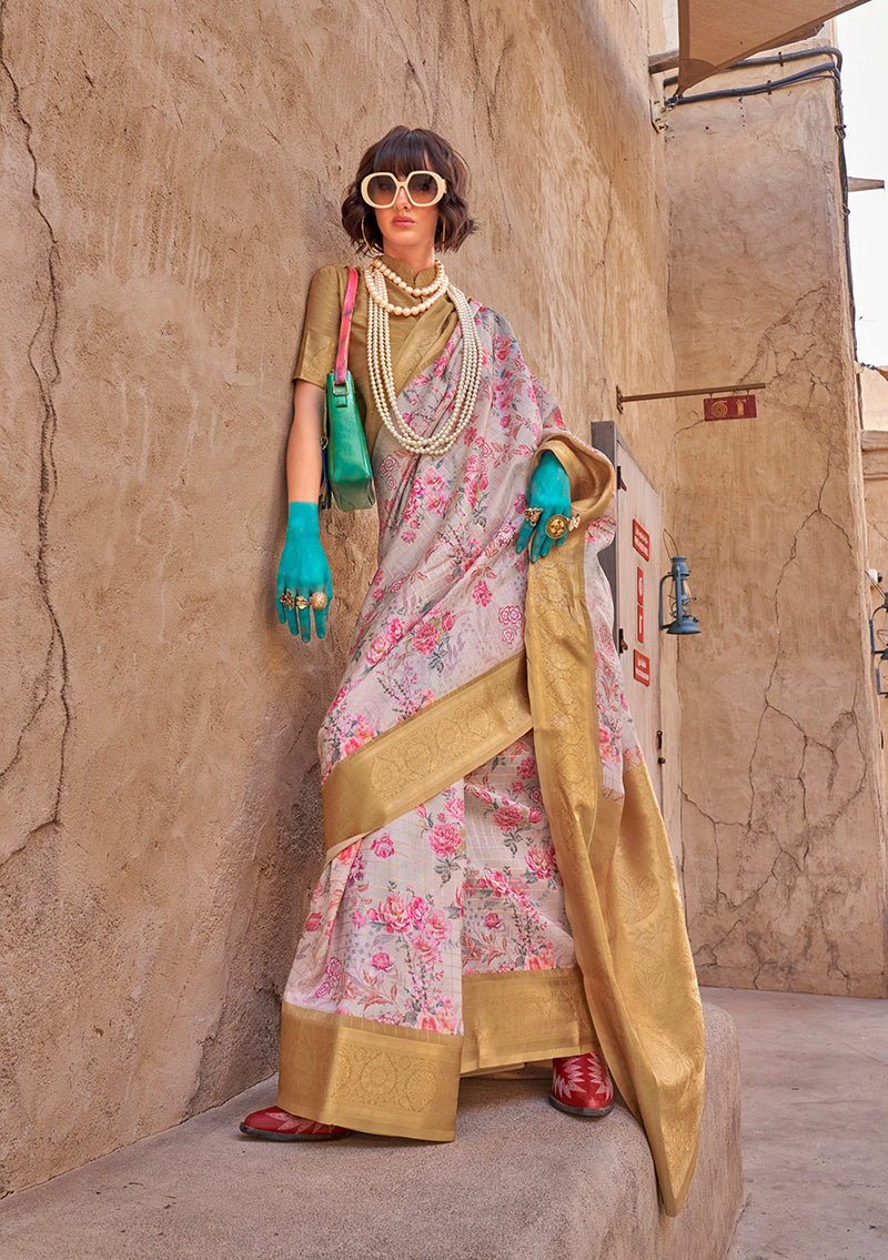 Light grey georgette saree featuring intricate digital print and a decorative ethnic border.