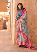 Stunning aqua blue georgette saree with ethnic weaving and digital print detailing