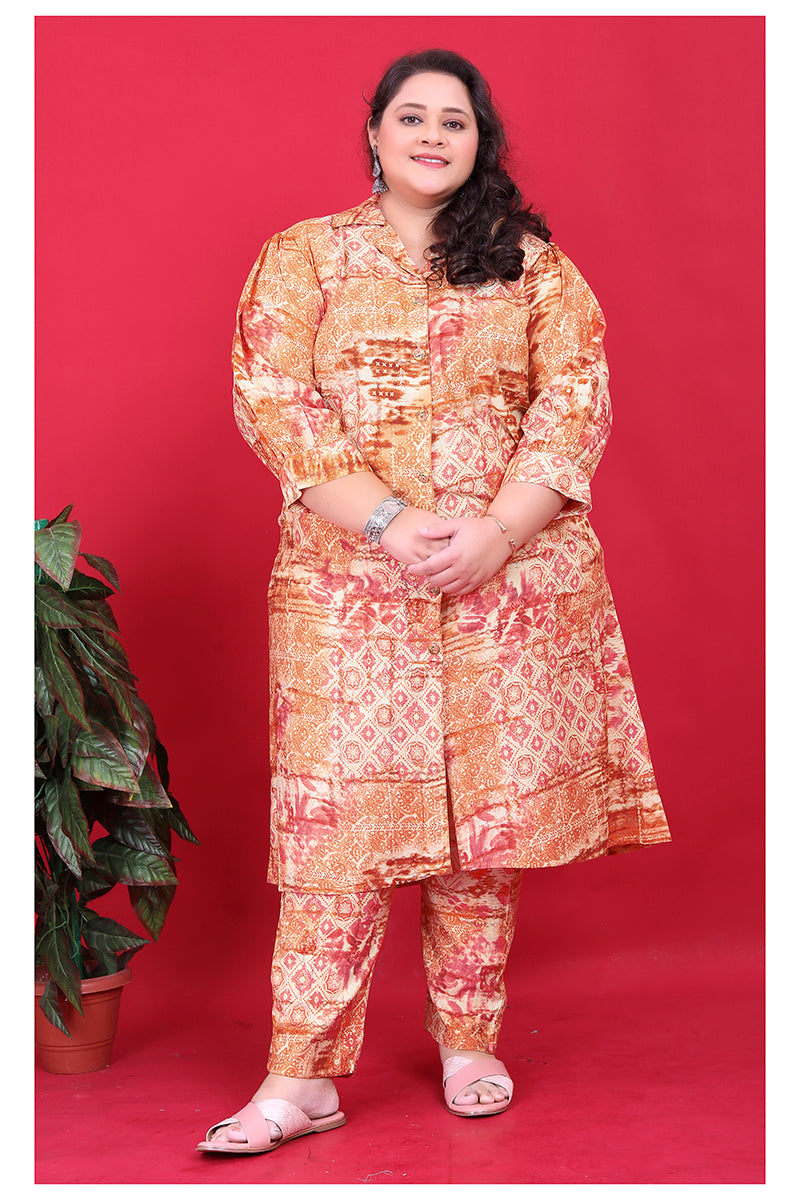 Model wearing a vibrant orange floral print rayon co-ord set with 42-inch length kurta