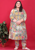 Woman wearing a multicolor rayon floral print co-ord set with collared button-down top and matching bottoms.