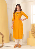 Mustard colored Vision silk kurti adorned with detailed handmade embroidery