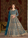 Teal floor-length net gown with detailed embroidery for special occasions