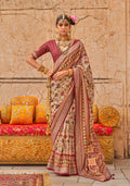A beautiful cream viscose silk saree with subtle prints.
