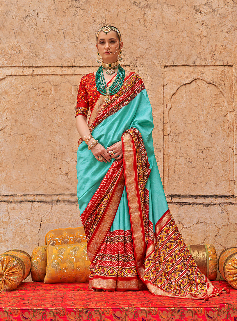 Firozi viscose silk saree with elegant print work and matching blouse piece