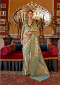 Cream and light green Tussar silk saree with elegant digital print border