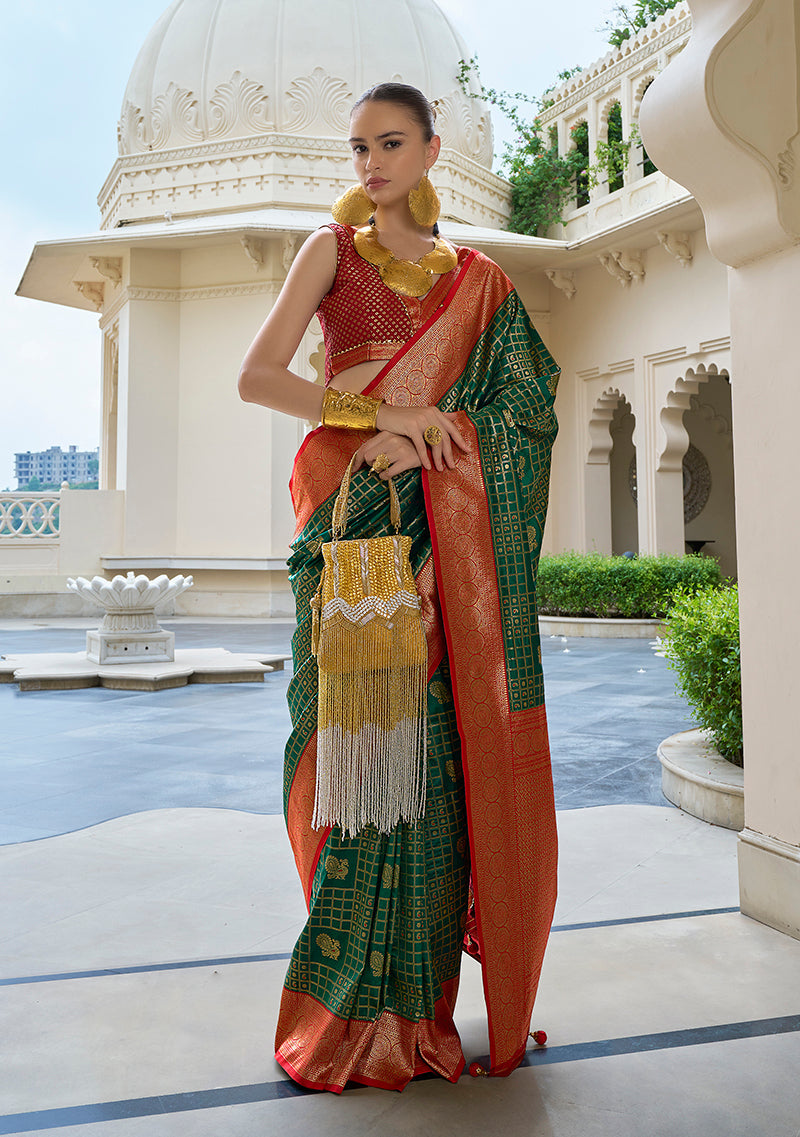 Dark green Banarasi silk saree with intricate gold weaving work
