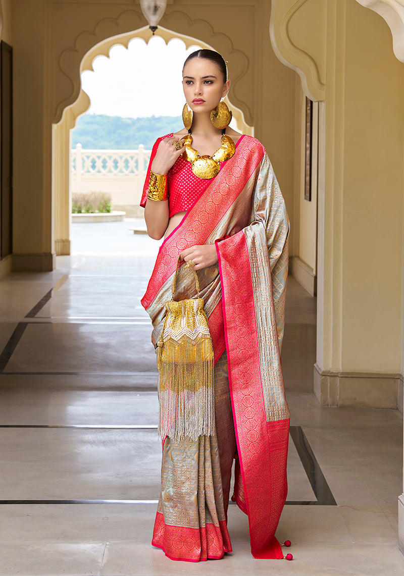 Light grey Banarasi silk saree with intricate traditional weaving patterns