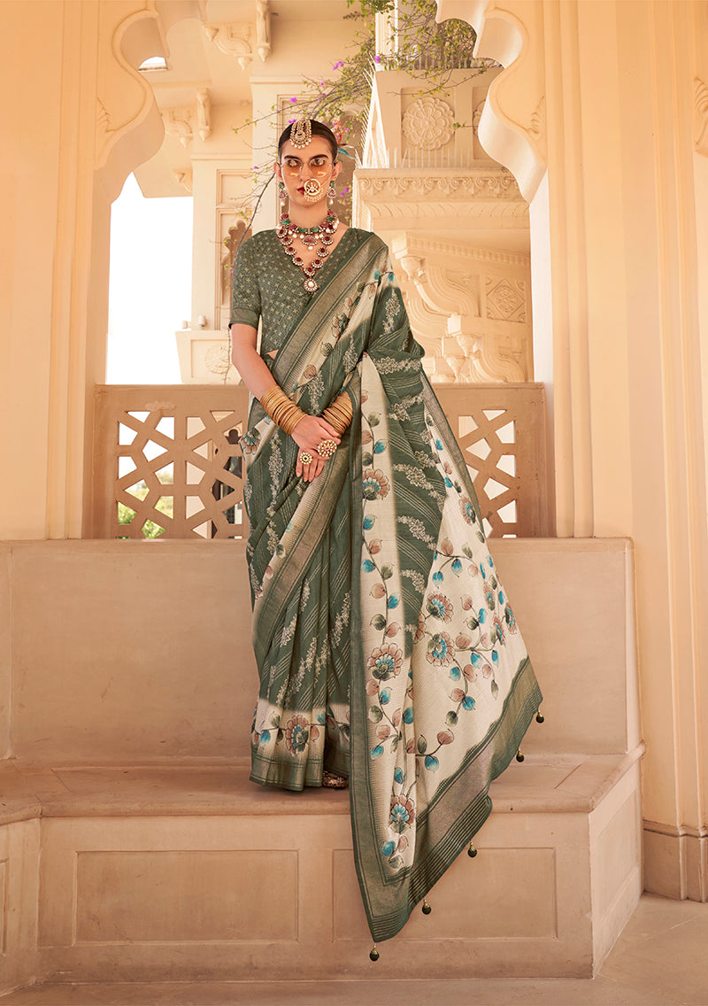 Dark green silk saree featuring intricate metallic foil print details