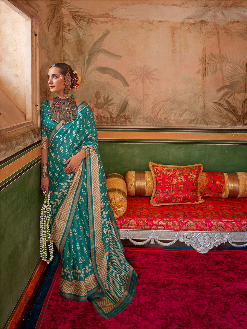Aqua blue mercerized sigma silk saree with a luminous finish and elegant drape