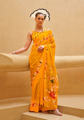 Elegant yellow georgette saree with contemporary printed patterns for festive occasions
