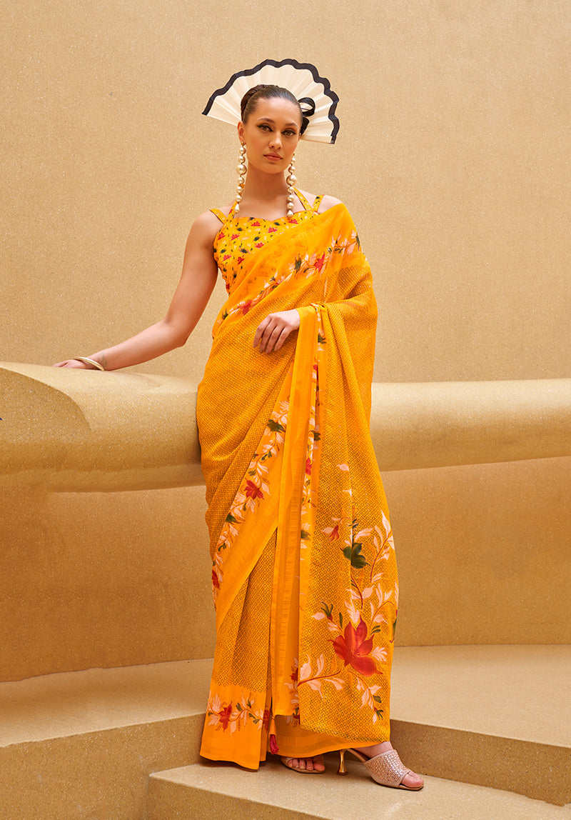Elegant yellow georgette saree with contemporary printed patterns for festive occasions