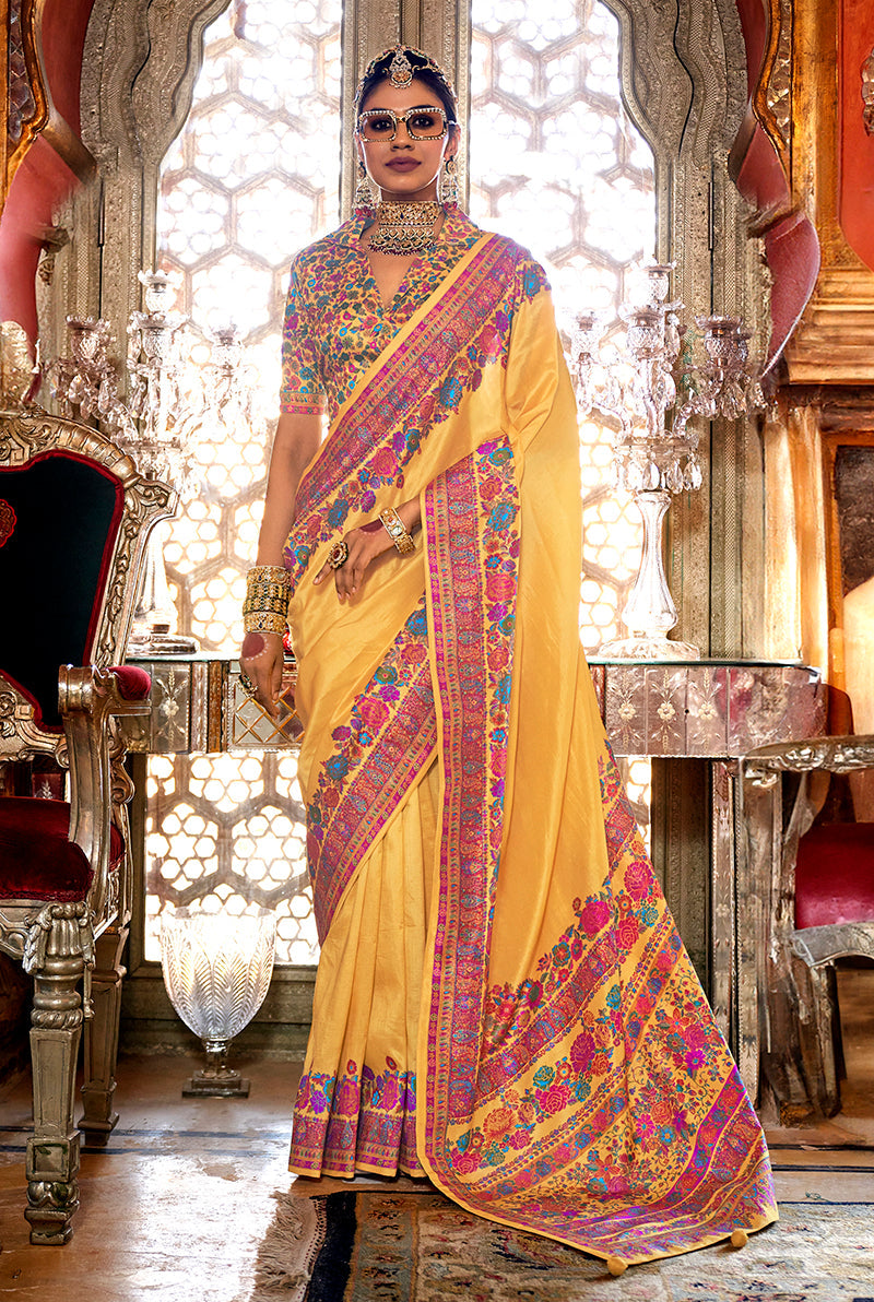 Vibrant yellow printed traditional silk saree with included blouse