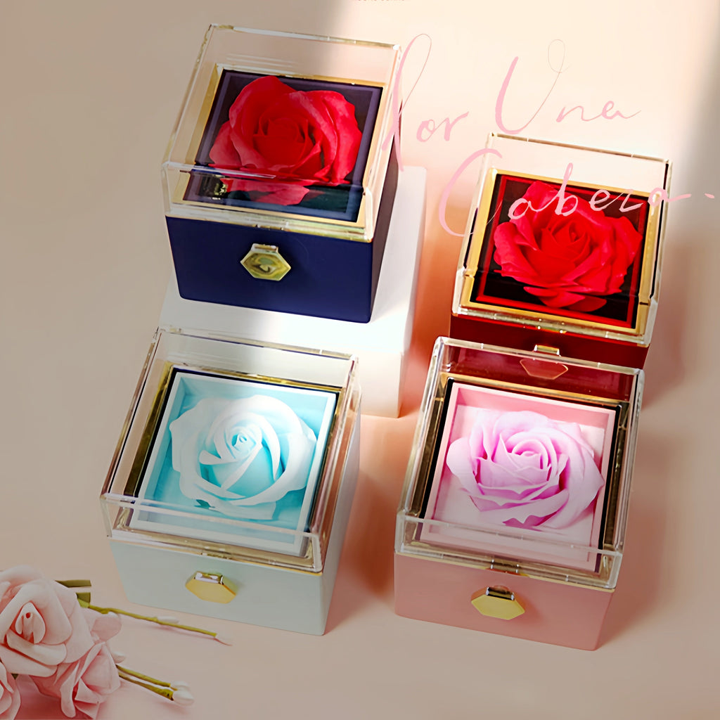 A luxurious rotating rose jewelry gift box with a preserved flower and a pull-out storage drawer.