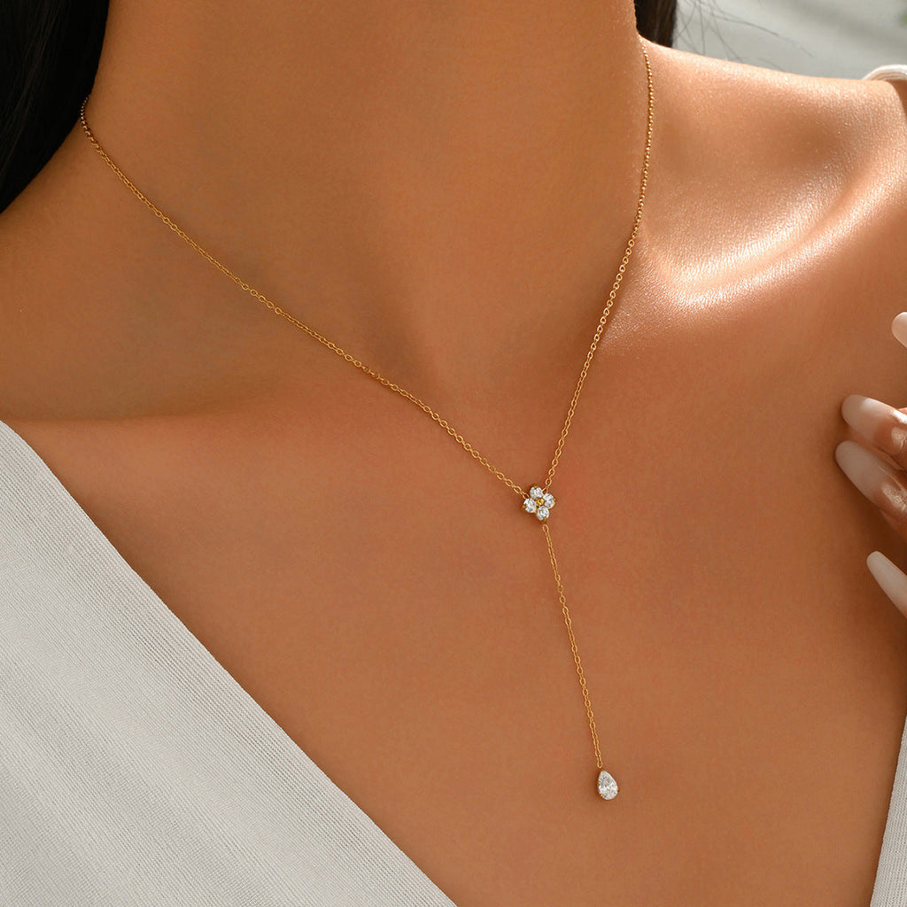 Elegant geometric oval zircon pendant on a stainless steel cross chain