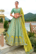Sea green silk bridal lehenga choli with intricate Khatli embroidery for weddings