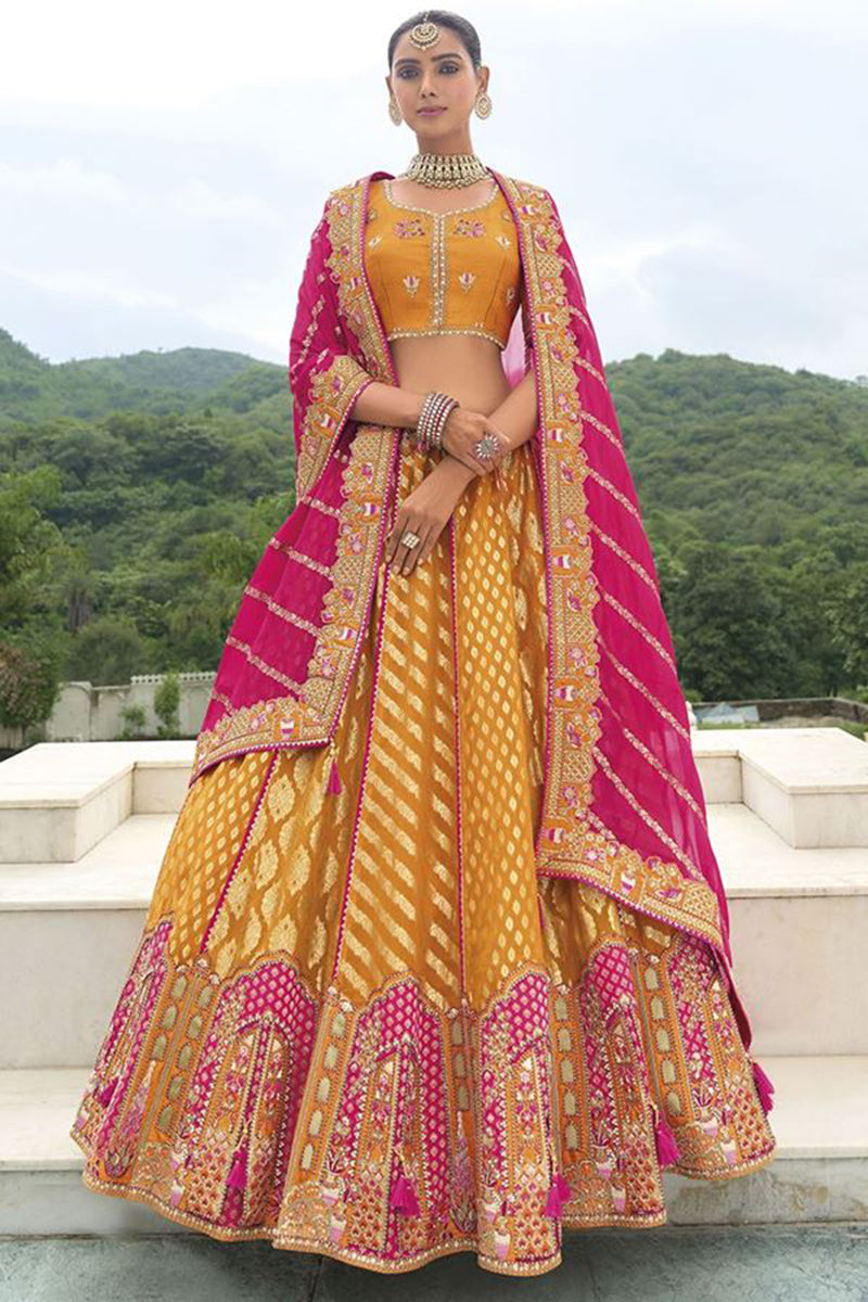 Beautiful orange silk bridal lehenga choli with detailed Khatli embroidery work