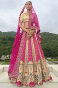 Rani pink and cream bridal lehenga choli with detailed embroidery and Khatli work