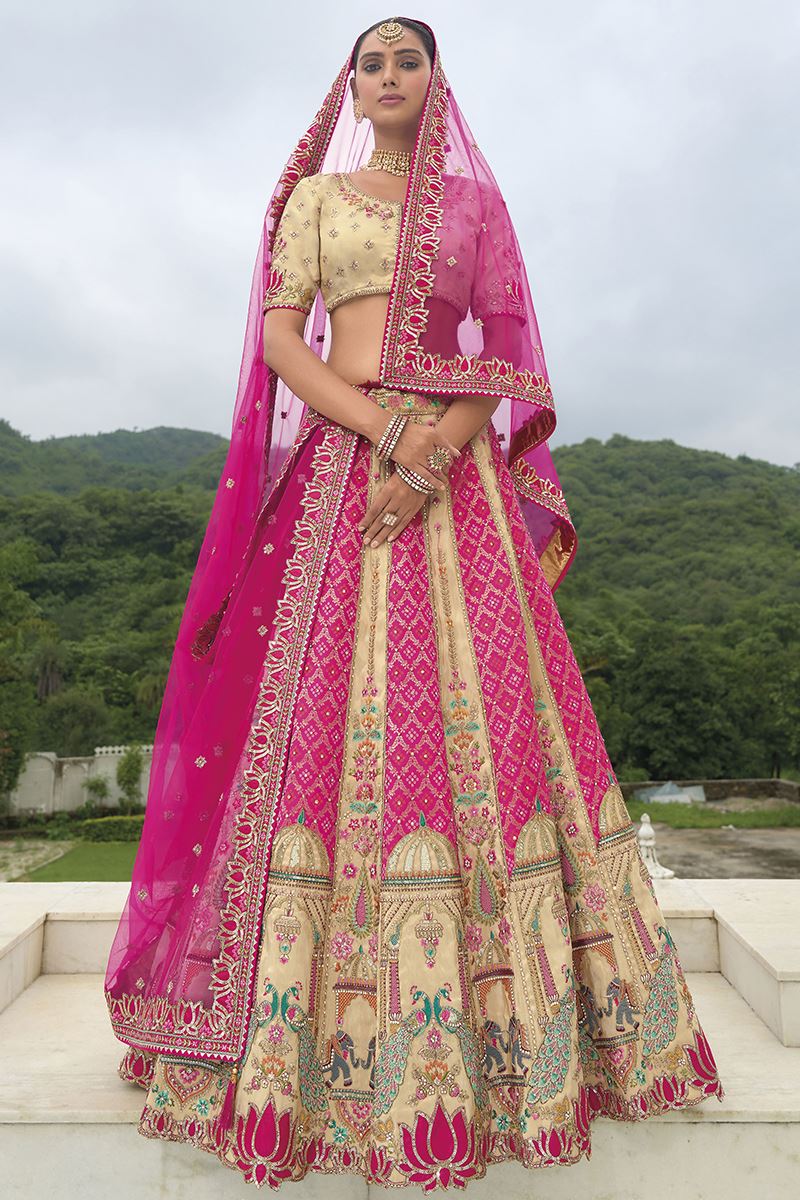 Rani pink and cream bridal lehenga choli with detailed embroidery and Khatli work