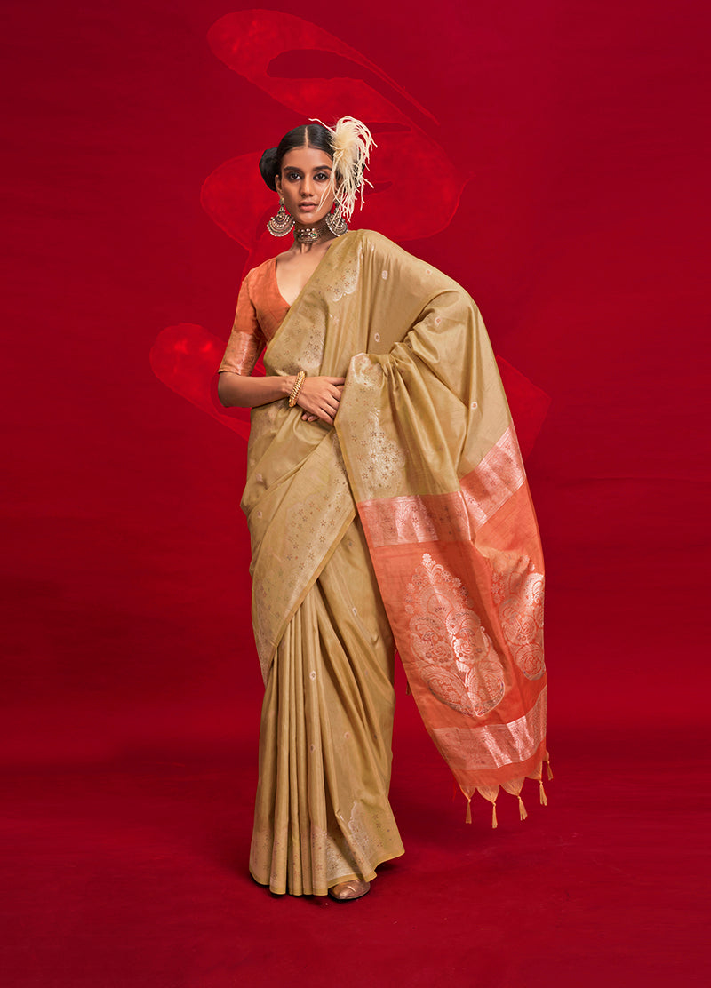Beige silk saree with traditional weaving details for a classic aesthetic